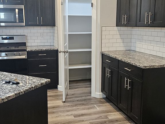 Kitchen with large island and pantry