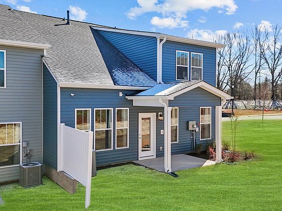 Functional design and eye-catching details in this accomplished townhome at Aspen Ridge in Lyman, SC