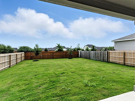 Backyard With Covered Patio