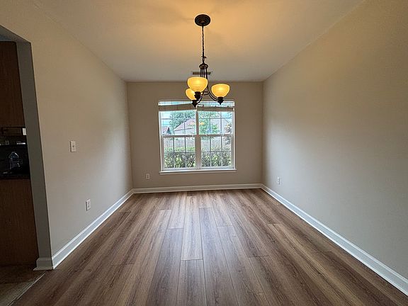 Dining room or office space at the back of home.