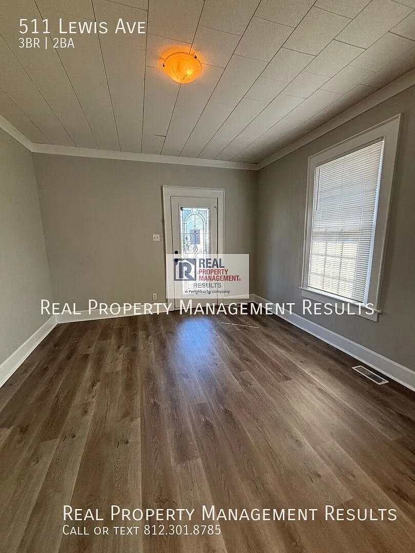 Inviting East Side Home with Front Porch Swing & Back Deck — Photo 3