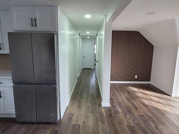 Open floor plan (kitchen to Dining room/hallway)