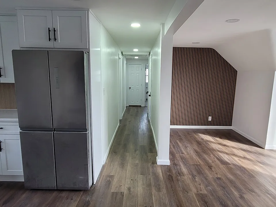 Open floor plan (kitchen to Dining room/hallway)