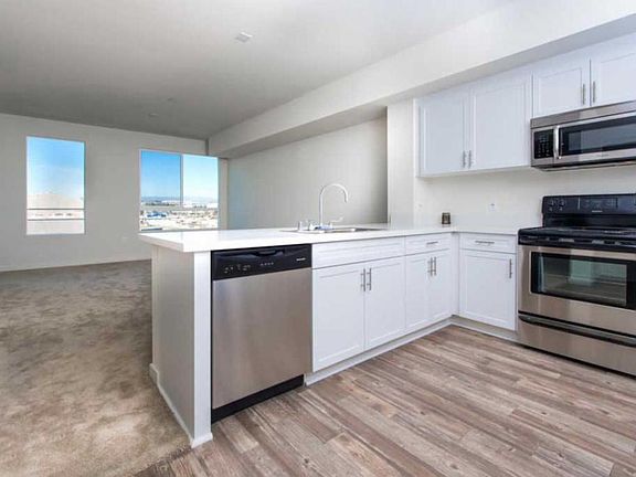 Open concept from the kitchen flowing into the living room.