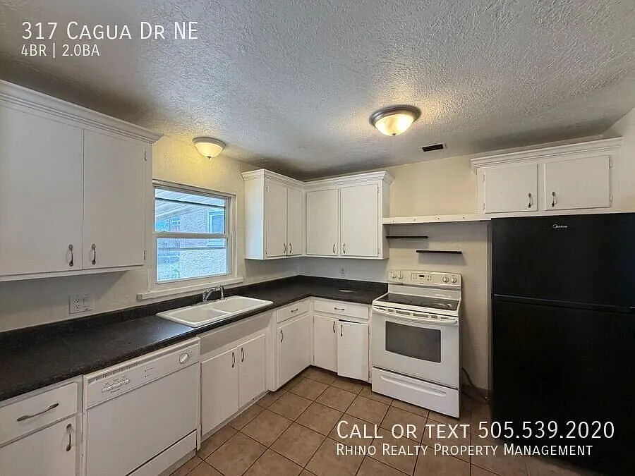 First Month's Rent Free! Quaint 4 Bedroom 2 Bathroom Home In The NE! — Photo 3