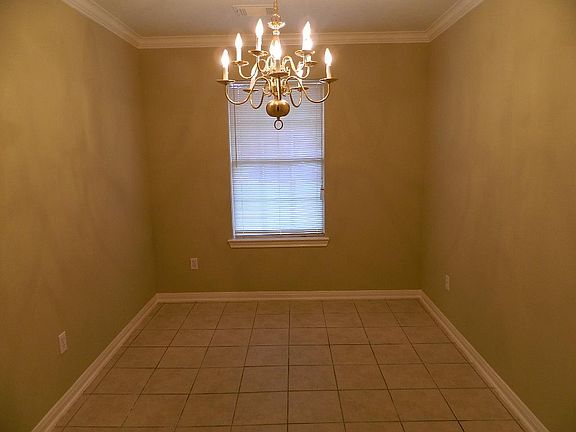 Formal Dining - Note beautiful chandelier!