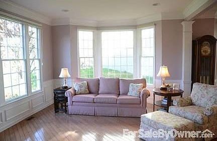 Living Room
						:
						Living room with bay window with Hunter Douglas blinds