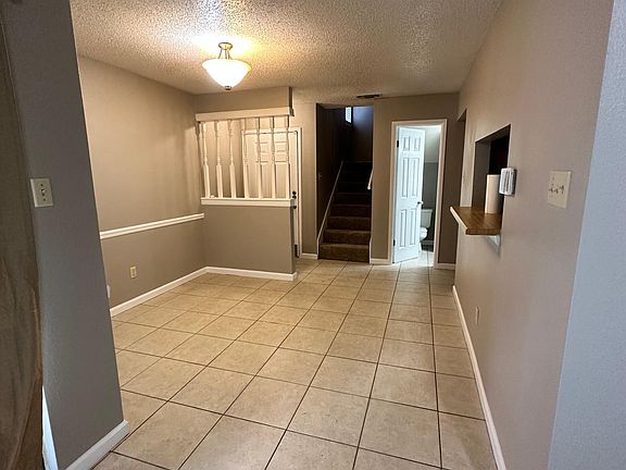 Dining area with Breakfast bar into kitchen