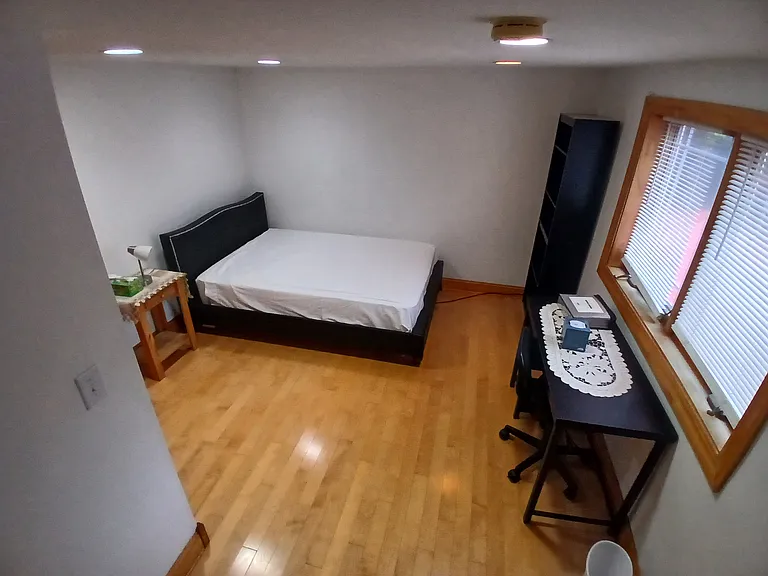 Full width bed + Lengthy walk-in closet