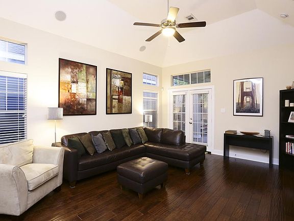 Light and bright open living space with tons of space for large sectional seating!