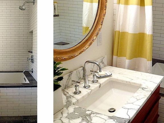 Downstairs full bath with new large soak tub. 