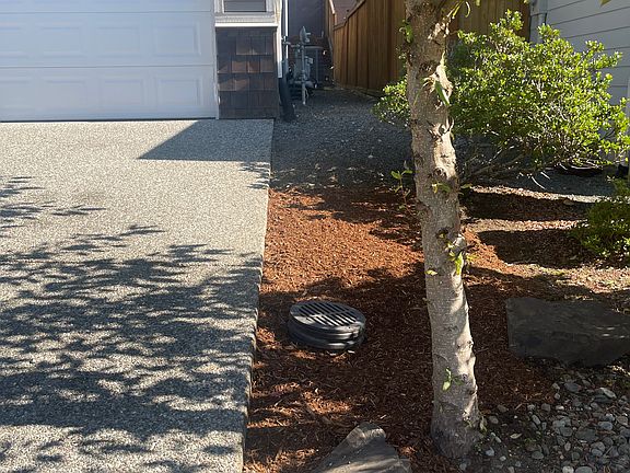Neat and clean exterior with fresh mulch to enhance the beauty of the house