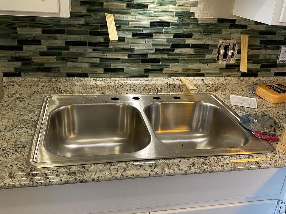 new counter, sink and backsplash