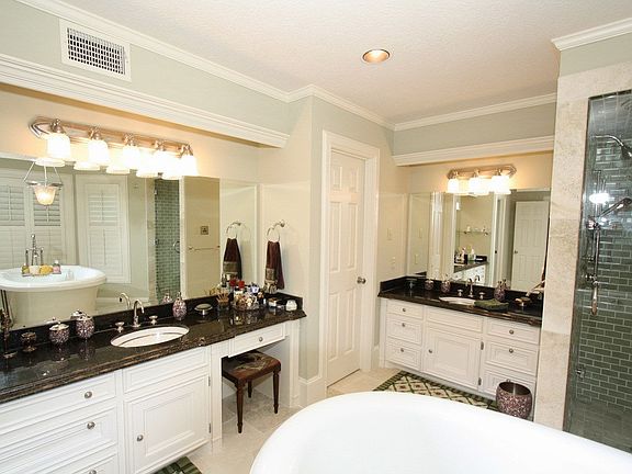 View from your aquatic tub of the granite vanities, hand painted sinks 