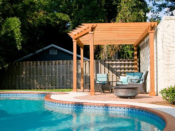 Backyard w/ pool and pergola