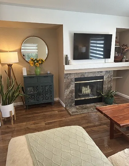 Family room with a real wood burning or gas fireplace