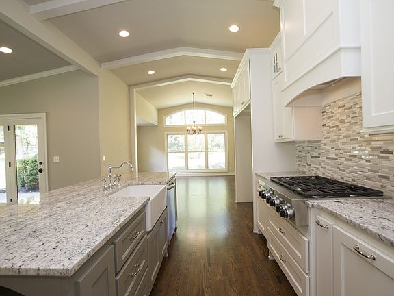 View from Kitchen into Sunny Breakfast Room.