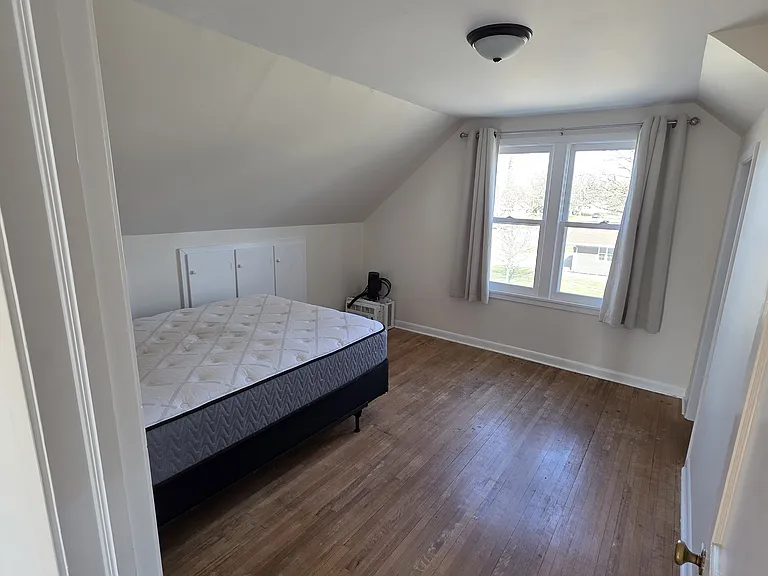 Upstairs Bedroom 1 - spacious closet as well as built-in cabinets for storage.