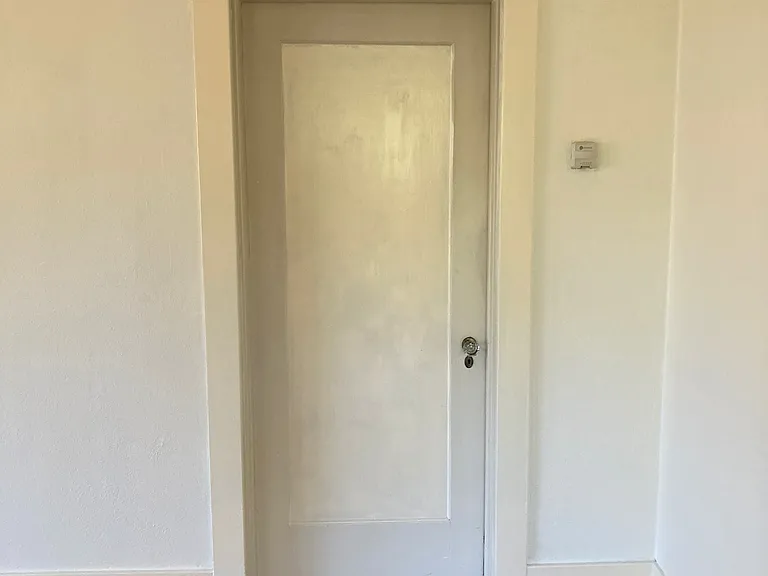 View of hall door in living room