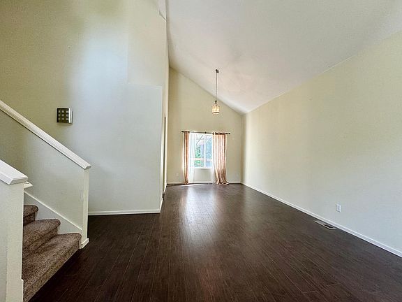 Nice living room and dining room with laminate flooring