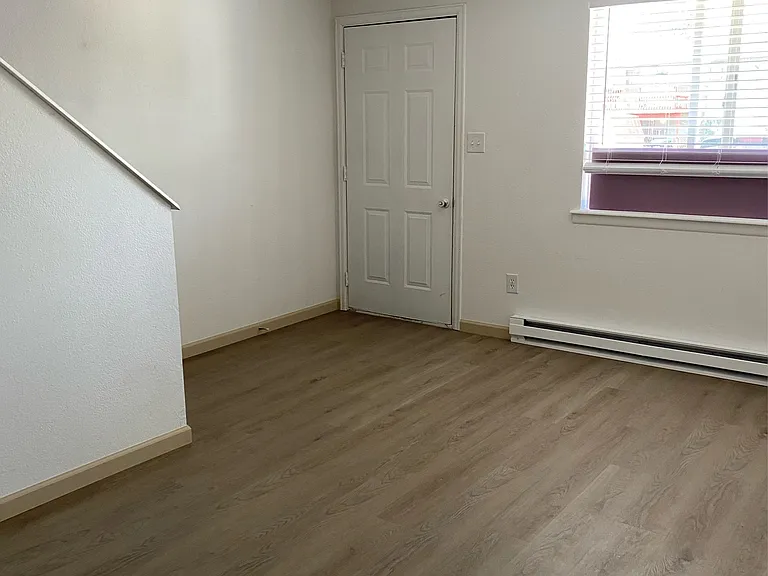 Livingroom facing front door entrance