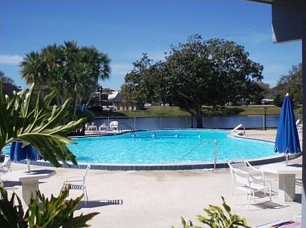 Heated Community pool with hot tub and sauna