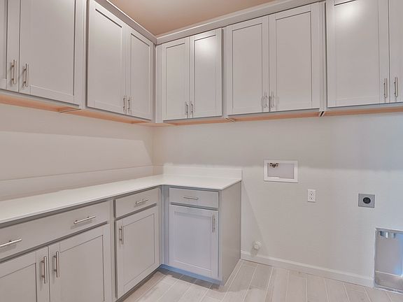 Residence 1 laundry room at a nearby Meritage community.
