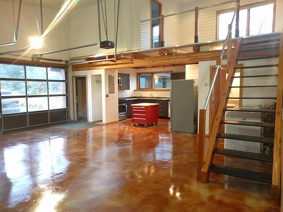 Studio living/dining. Bedroom/loft upstairs.