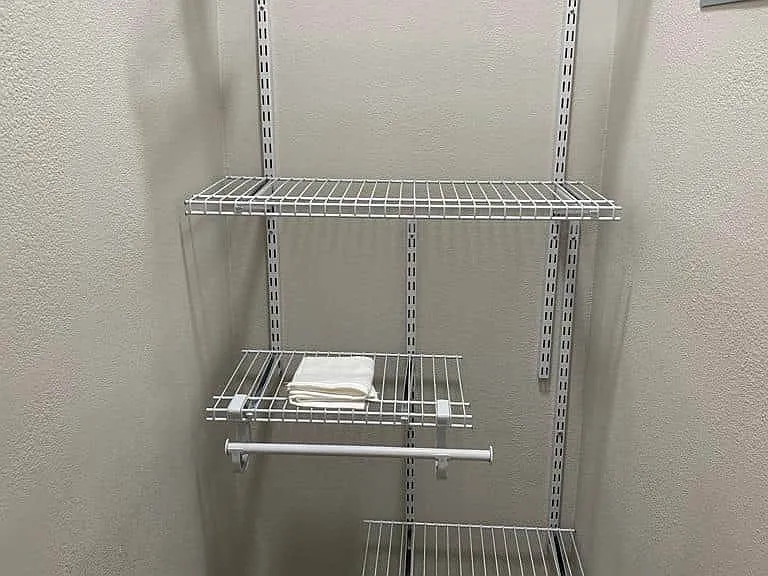 Open closet setup with hangers for convenience