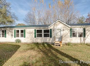 7158 S Apple Hill Rd, Rothbury, MI 49452