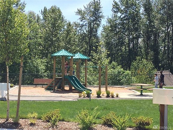 Play structure and picnic area at the community park.