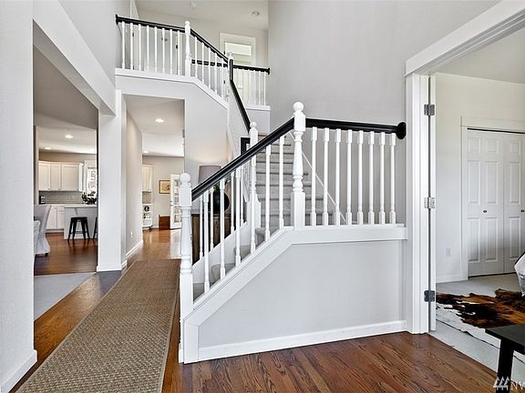 The Sellers have enjoyed countless evenings watching the beautiful sky and sunsets on the porch! Peaceful territorial views are enhanced with weeping willows, maples and the sky.