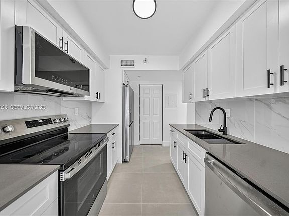 5th image of 3530 Mystic Pointe Dr APT 1606