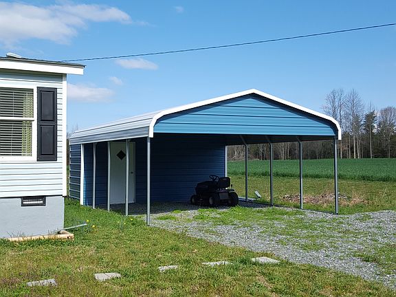 Large carport with storage s