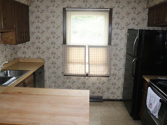 Kitchen facing front of unit
