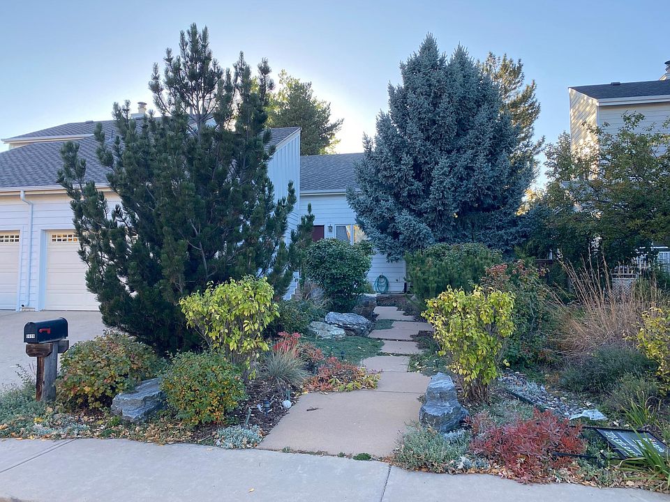 Entry walk from street. 2 car garage to left. Nicely landscaped.