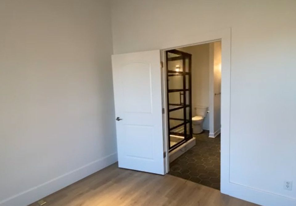 Looking from master bedroom into bathroom and laundry.