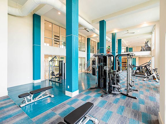 Two-Story Fitness Center with Cardio, Resistance & Free Weights