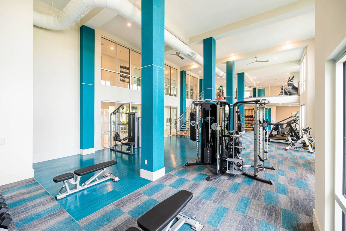 Two-Story Fitness Center with Cardio, Resistance & Free Weights