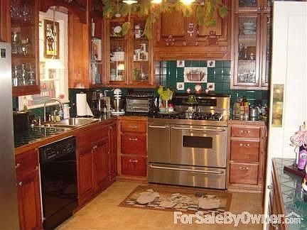 LOVE the kitchen
						:
						cooks dream stove and totally updated wood cabinets with breakfast area!