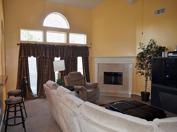 The family home of this room is a large enough for comfortable furniture.