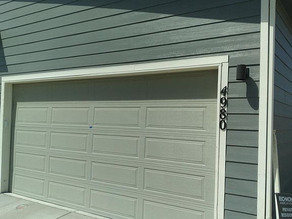 Two-car garage with keyless entry keypad.