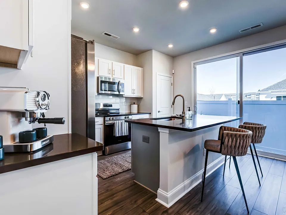 Discover the joy of spacious cooking in our cottage kitchens. Ample counter space awaits on your quartz countertops.