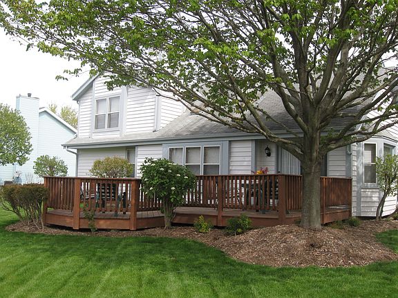 Large backyard with multi-level deck