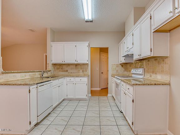 2nd image of 8719 Townsquare Dr N