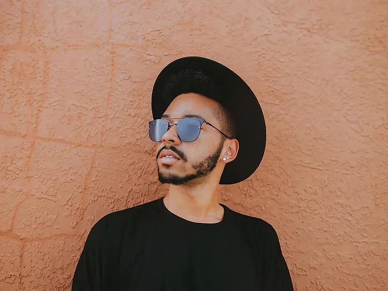 Modern Street Style Portrait with Bold Wall Backdrop