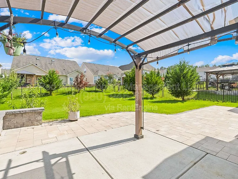 10697 Sky Chase Ave NW — Photo 30