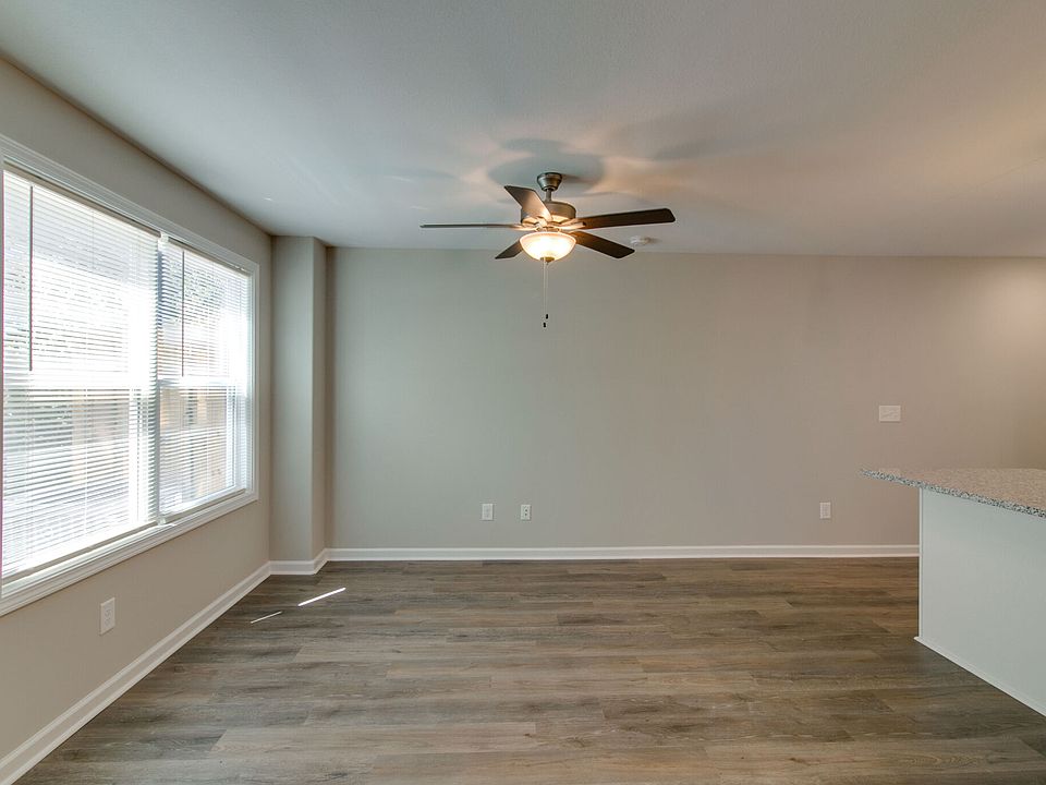 Great Room at Back near Patio of Main Level with LVP Flooring