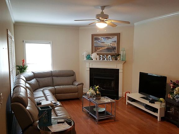 Living Room -older pic with furniture showing. floor color now lighter