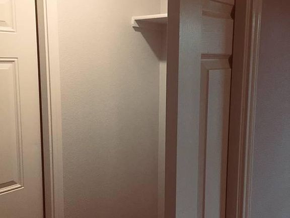 Washer / dryer in between living room and garage